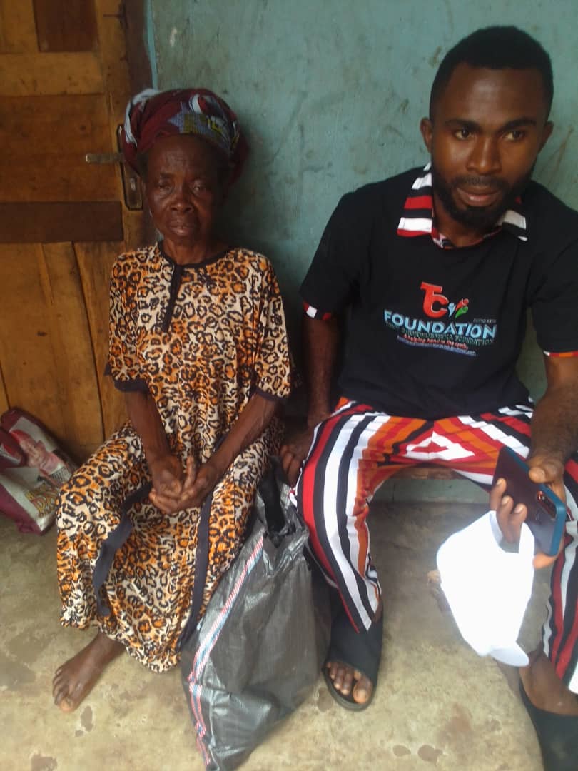 A home visit to an elderly woman, with provisions left behind.