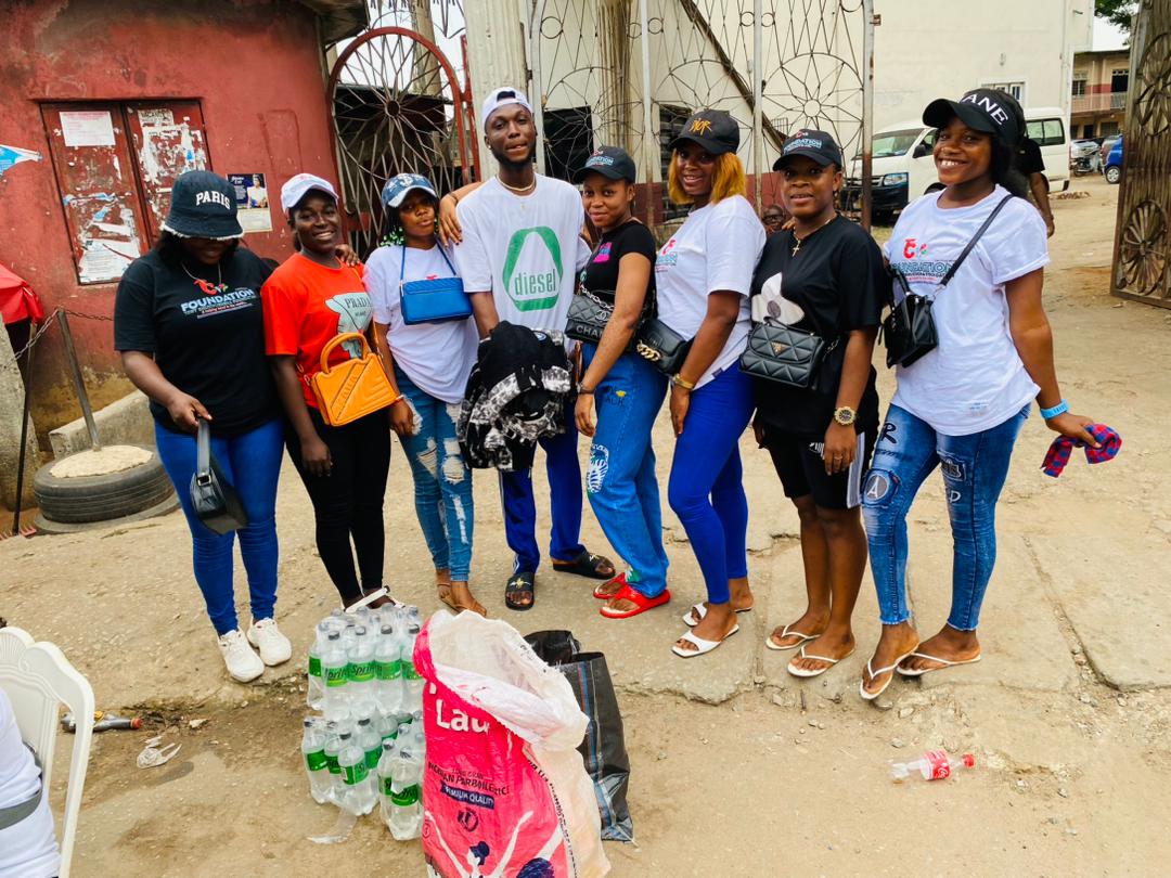 The team pauses for a photograph at the start of an outreach.